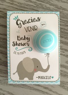 a card with an elephant and its baby shower ball attached to it's back