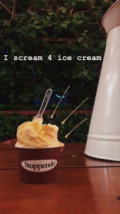 an ice cream sundae is sitting on a table