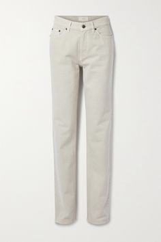 The Row's 'Carlton' jeans are made from rigid denim in an ecru hue that'll go with just about anything. They sit high on the waist and have long, straight legs with slouchy cuffs. Wear yours with the brand's loafers. Net A Porter The Row, Luxury White Straight Leg Bottoms, Luxury Off White Straight Leg Bottoms, Luxury White Straight Jeans, White Rigid Denim Straight Leg Bottoms, Latest Jeans, Oversized Shirt, Straight Jeans, Black Denim