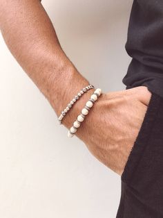 Two different white beaded bracelets fro every man in white and silver color with unique beads. In Christina Christi Jewels store you can see more than 50 designs in Men's Bracelets. You can have them in 2-4 Days with DHL EXPRESS SHIPPING MATERIALS - White and Metal Beads. - Elastic cord. - You can choose four different dimensions for your hand. DIMENSIONS * 17 cm - 6.6'' * 19 cm - 7.4'' * 21 cm - 8.2'' * 23 cm - 9.0'' * IN THIS LISTING THERE ARE TWO DIFFERENT BRACELETS. IF YOU 'D LIKE THEM ALL, Everyday White Sterling Silver Bracelet, Minimalist Silver Beaded Bracelets For Everyday, Adjustable Minimalist Sterling Silver Bracelet, White Stackable Beaded Bracelets For Everyday, Modern White Adjustable Pearl Bracelet, Modern White Beaded Bracelets As Gift, White Modern Beaded Bracelets, Modern White Beaded Bracelets, Modern White Beaded Bracelet