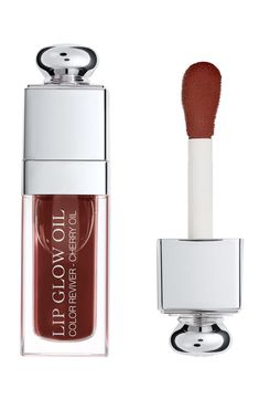 Free shipping and returns on Lip Glow Oil at Nordstrom.com. What it is: A nourishing, glossy lip oil that protects and enhances your lips to bring out their natural color.What it does: Delivering sheer coverage with a shiny finish, this nonsticky, non-greasy, rich and balmy oil combines the mirror shine of a lip gloss with the comfort of intense lip care. Enriched with cherry oil, its pampering formula creates protection against stress factors and dryi Dior Lip Glow Oil Mahogany, Dior Lip Oil Mahogany, Cherry Bites, Hogwarts Clothes, Sephora Wishlist, Dior Lip Glow Oil, Dior Lip Oil, Oil Texture, Lip Glow Oil