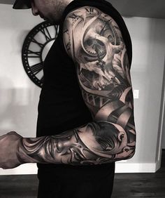 a man with a tattoo on his arm