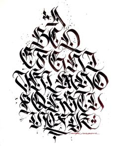 an arabic calligraphy type is shown in black ink on a white paper with the word,