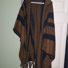 Brand New, Poncho Cardigan With Fringe Bottom Cozy Brown Outerwear One Size, Brown Long Sleeve Outerwear, One Size, Brown Long Sleeve Outerwear One Size, Oversized Brown Cape Shawl, One-size Brown Cape For Fall, One Size Brown Cape For Fall, Brown Fall Cape Outerwear, Brown Cape For Cold Weather, Oversized Brown Poncho Cape