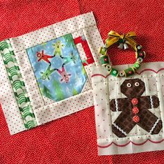 two handmade quilts on a red table cloth, one with a gingerbread cookie and the other with an ornament