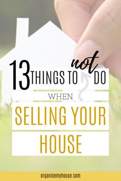 a hand holding a house with the words 13 things not to do when selling your house