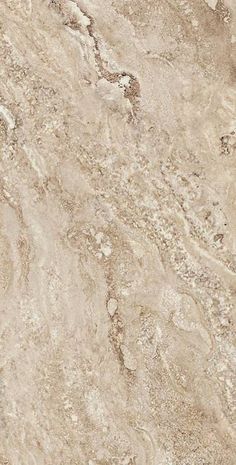 a close up view of a marble floor with brown and tan colors on it's surface