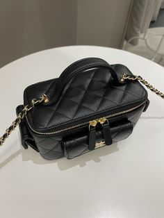 Chanel Polly Pocket Multi Pocket Vanity Case BagBlack Caviar GHWMirror interiorSize 16 x 10 x 8 cmChain drop 56 cmMicrochip StickerJuly 2023New with sealIncludes full set box, dust bag and receiptPrice now 5400 sgd 3990 usd CN5507-03 Luxury Portable Top Handle Box Bag, Luxury Portable Box Bag With Top Handle, High-end Black Pouch Satchel, Luxury Portable Top Handle Shoulder Bag, Luxury Portable Pouch Box Bag, Luxury Handheld Portable Box Bag, Luxury Portable Handheld Box Bag, Luxury Phone Bag With Removable Pouch And Top Handle, Luxury Black Satchel Pouch