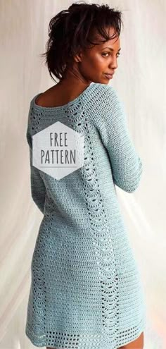 a woman in a blue knitted sweater with the words free pattern on it,