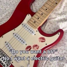 an electric guitar with the words do you want a b f? no i want a electric guitar