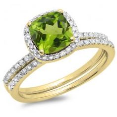 an engagement ring with a cushion cut peridot surrounded by white and yellow diamonds