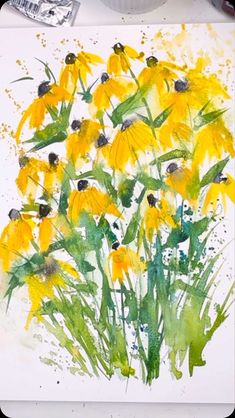 watercolor painting of yellow flowers on white paper