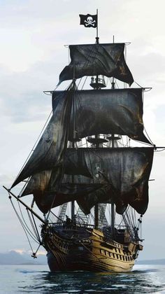 an old pirate ship sailing in the ocean