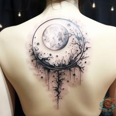 the back of a woman's body with an artistic tattoo design on it, and a moon in the background