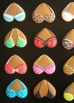 nine decorated cookies with different types of bras and bow ties on top of them