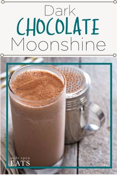 a drink in a glass with chocolate on top and the words dark chocolate moonshine above it