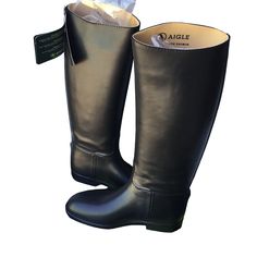 These Boots Are Perfect For Those Who Want To Feel Stylish While Staying Comfortable During Wet Weather Conditions. The Aigle Brand Is Known For Its Quality And Durability, Making These Boots A Worthwhile Investment For Any Wardrobe. Wet Weather, Walker Boots, Fit N Flare Dress, Rain And Snow Boots, Boot Sandals, Weather Conditions, Shoes Heels Boots, Snow Boots, Laptop Bag