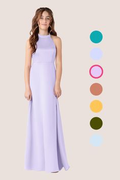 a woman in a long purple dress standing next to an assortment of color swatches