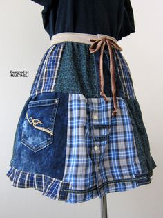 a skirt made out of old jeans is displayed on a mannequin