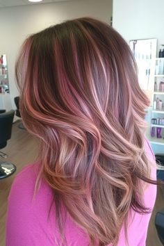 Woman with long, wavy hair in a salon, showcasing highlights in various shades of pink and brown. Neapolitan Hair, Hair Highlights Ideas, Shades Of Chocolate, Highlights Ideas, Color Safe Shampoo, New Hair Trends, Cool Skin Tone, Blonde With Pink, Green Highlights