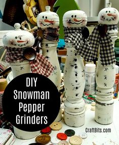 some very cute looking vases made to look like snowmen