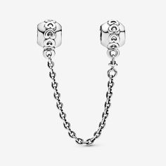 Complete your bracelet styling with a romantic touch. Hand-finished in sterling silver, this pretty Pandora safety chain keeps your charms safe on any Pandora Moments bracelet. The safety chain is minimally detailed with raised hearts around each clasp and its swivel ends prevent the chain from tangling while you wear it. Thread one side onto your bracelet before adding charms, connecting the unattached side of the safety chain on the other end once your charms are in place. - Pandora Band of Hearts Safety Chain Charm - Sterling silver - Sz. 2 in Pandora Safety Chain, Pandora Logo, Pandora Heart, Charms Pandora, Bracelet Pandora, Pandora Hearts, Pandora Bracelet Charms, Safety Chain, Pandora Bracelets