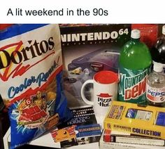 a pile of food and drinks sitting on top of a table