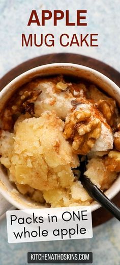 a close up of a bowl of food on a table with the words apple mug cake