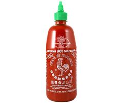 a bottle of ketchup with chinese writing on the top and an image of a rooster