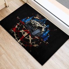 a door mat with an image of a monster truck on the front and side of it