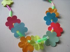 a necklace made out of plastic flowers