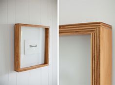 two pictures are hanging on the wall next to each other, one has a square wooden frame