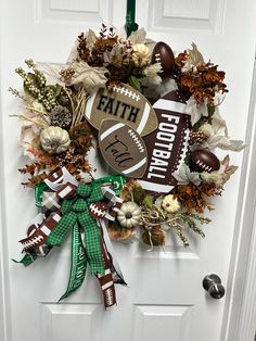 a football wreath is hung on the front door with a green ribbon and some decorations