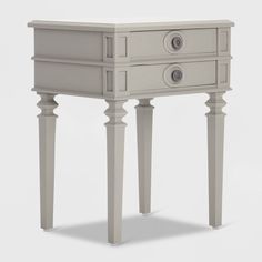 a white table with two drawers on one side and an open drawer on the other