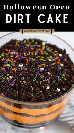 halloween oreo dirt cake in a glass bowl with sprinkles on top