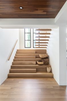 the stairs are made of wood and have wooden slats on them