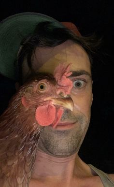 a man with his face painted like a chicken