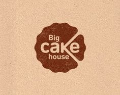 the logo for big cake house is shown in brown and tan colors on a beige background