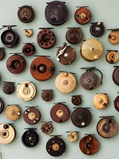 many different types of buttons on a wall