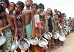 a group of young boys standing next to each other holding metal pots and pans