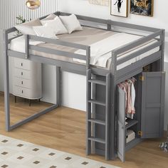 a loft bed with a desk underneath it and drawers under the bed, next to a white wall