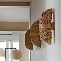 some baskets hanging on the wall in a room