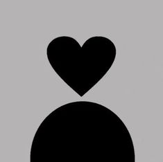 a black and white silhouette of a person with a heart on their head, against a gray background