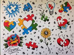 some colorful puzzle pieces with flowers and hearts on them