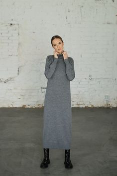 This long knitted turtle-neck dress is made of merino wool. Ruffled sleeves, ruffled bottom and straight loose type of the dress makes it super comfortable and stylish at the same time. This merino wool sweater type dress is also perfect for minimalists. MONALA Monala knitwear is handmade, each piece of garment is unique and will perfectly fit for those women who want to maintain their wardrobes minimalistic, basic and versatile. PRODUCTION The dress is made of 100% merino wool, using a manual k Gray Midi-length Sweater Dress For Fall, Fall Wool Sweater Dress, Turtleneck Wool Sweater Dress For Fall, Wool Turtleneck Sweater Dress For Fall, Fall Wool Turtleneck Sweater Dress, Long Sleeve Wool Sweater Dress For Work, Oversized Long Sleeve Maxi Dress For Winter, Long Wool Sweater Dress For Fall, Long Sleeve Cashmere Dress For Winter