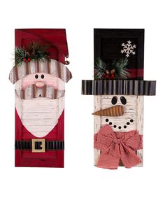 two christmas decorations made out of wood with santa and snowman faces on the front