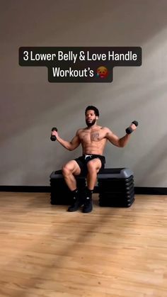 a man sitting on top of a bench with dumbbells in front of him