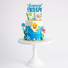 a birthday cake with an ocean theme on it