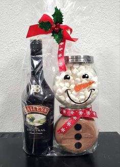 a snowman made out of marshmallows and a bottle of booze