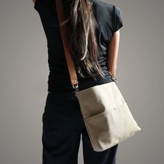 Urban-chic style crossbody bags that are neutral in color and effortlessly casual. When you need a mid-sized bag with easy access front pockets, just the right amount of not-too-slouchy shape and the perfect neutral shade, our updated take on the modern hobo bag is sized just right for everyday, on-the-go use. This listing is for the MEDIUM size bag in Khaki canvas. Chic Shoulder Bag With Pockets For On-the-go, Beige Hobo Bag With Pockets For On-the-go, Everyday Taupe Leather Bucket Bag, Everyday Taupe Bucket Bag With Removable Pouch, Crossbody Bucket Bag With Pockets, Beige Crossbody Bucket Bag For Everyday, Everyday Beige Bucket Bag With Pockets, Everyday Beige Crossbody Bucket Bag, Beige Crossbody Shoulder Bag For Travel